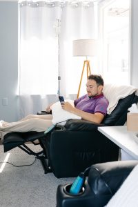 Employee receiving an on-site IV drip during a workplace wellness day in Cincinnati